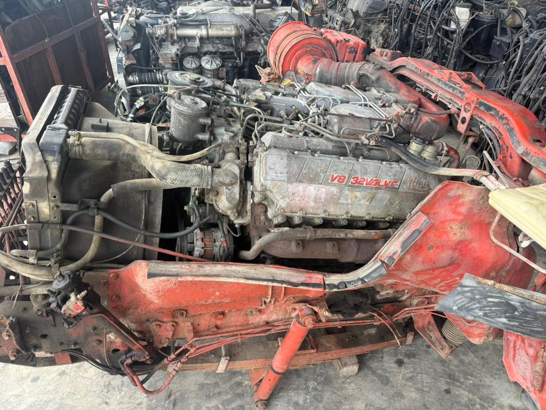 Hino V8 32-valve heavy diesel powertrain pulled and staged for inspection.